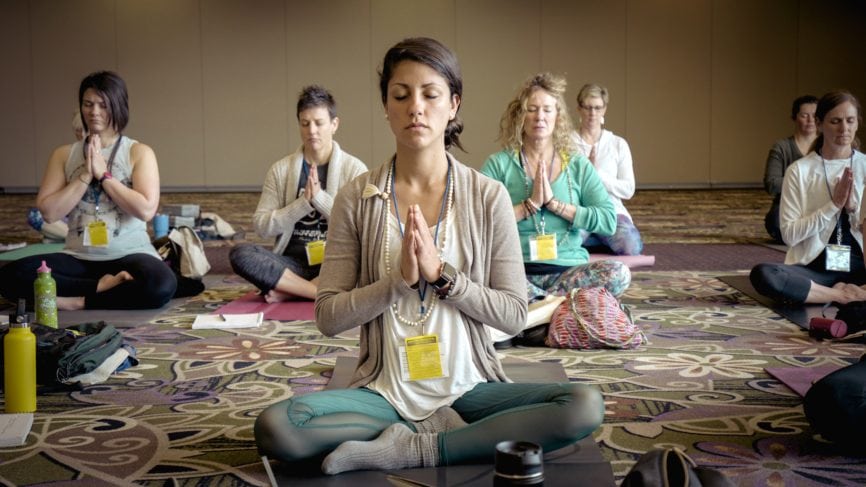 group yoga as part of conference agenda